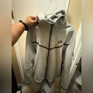 Nike tech fleece gray hoodie worn is a size xxl, comes washed as well.